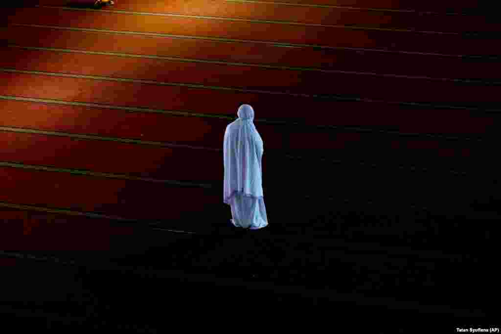 A Muslim woman prays at the Istiqlal Mosque in Jakarta. (AP/Tatan Syuflana) 