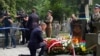Президент Польщі Анджей Дуда вшановує воїнів Армії УНР на кладовищі у столиці Польщі. Варшава, 14 серпня 2022 року
