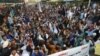 PTM activists take part in a protest against the arrest of party leader Alamzeb Mehsud in Karachi on January 23.