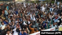 PTM activists take part in a protest against the arrest of party leader Alamzeb Mehsud in Karachi on January 23.