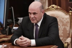 Mikhail Mishustin attends a meeting with Putin at the Kremlin on January 15.