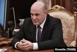 Mikhail Mishustin attends a meeting with Putin at the Kremlin on January 15.