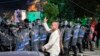 Colonelul Cătălin Paraschiv, dirijând forțele de intervenție specială ale Jandarmeriei la 10 august 2018, când protestele pașnice au fost înăbușite de forțele de ordine