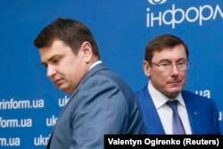 A highly controversial bill would have seen Artem Sytnyk (left) the head of Ukraine's anticorruption bureau removed from his post following a complaint from Prosecutor-General Yuriy Lutsenko (right) that the organization had exceeded its authority. (file photo)