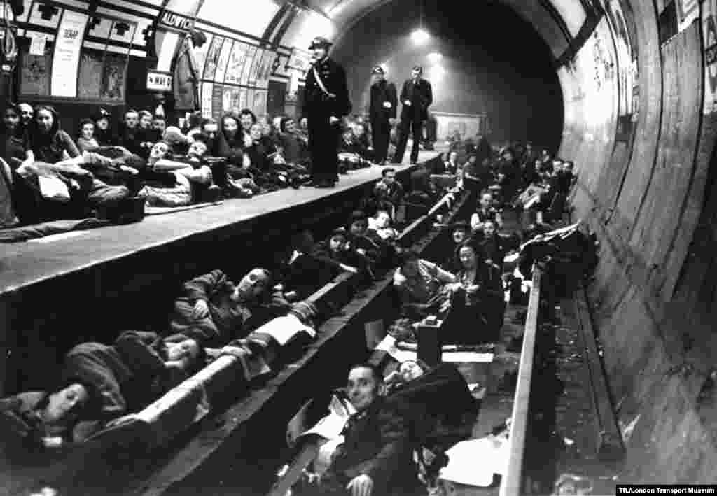Thousands of Londoners took shelter in the Underground during the Blitz, the German aerial campaign against Britain during World War II. Here people take cover in Aldwych Station, which was also used as a storehouse for artistic and historical treasures. 