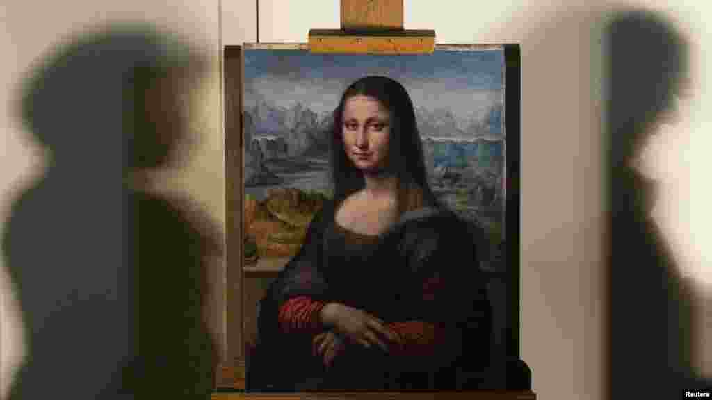 A copy of Leonardo Da Vinci's "Mona Lisa" is displayed at Madrid's Prado museum. The painting was completed by one of Da Vinci's pupils at the same time as the original and in the same workshop. (REUTERS/Sergio Perez)