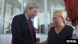 Johannes Hahn, the European enlargement commissioner meets with Montenegrin journalist Olivera Lakic in Podgorica on May 11. 