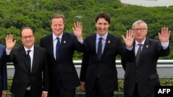 U.K Prime Minister David Cameron (second left) with French President Francois Hollande (left), Canadian Prime Minister Justin Trudeau, and EC Presideent Jean-Claude Juncker at the G7 summit in Japan. 