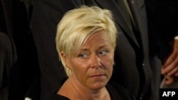 The leader of Norway's Progress Party, Siv Jensen, attends a Mass for victims of the July 22 government office bombing and shooting spree at a youth camp, at the Domkirken Church in Oslo on July 24.