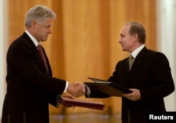 Президент США Білл Клінтон і президент Росії Володимир Путін
