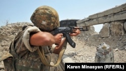 Nagorno-Karabakh -- An Armenian soldier on frontline duty near Mataghis village, 20Jul2012