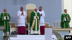 Pope Francis leads an open-air Mass at Santakos Park in Kaunas on September 23.