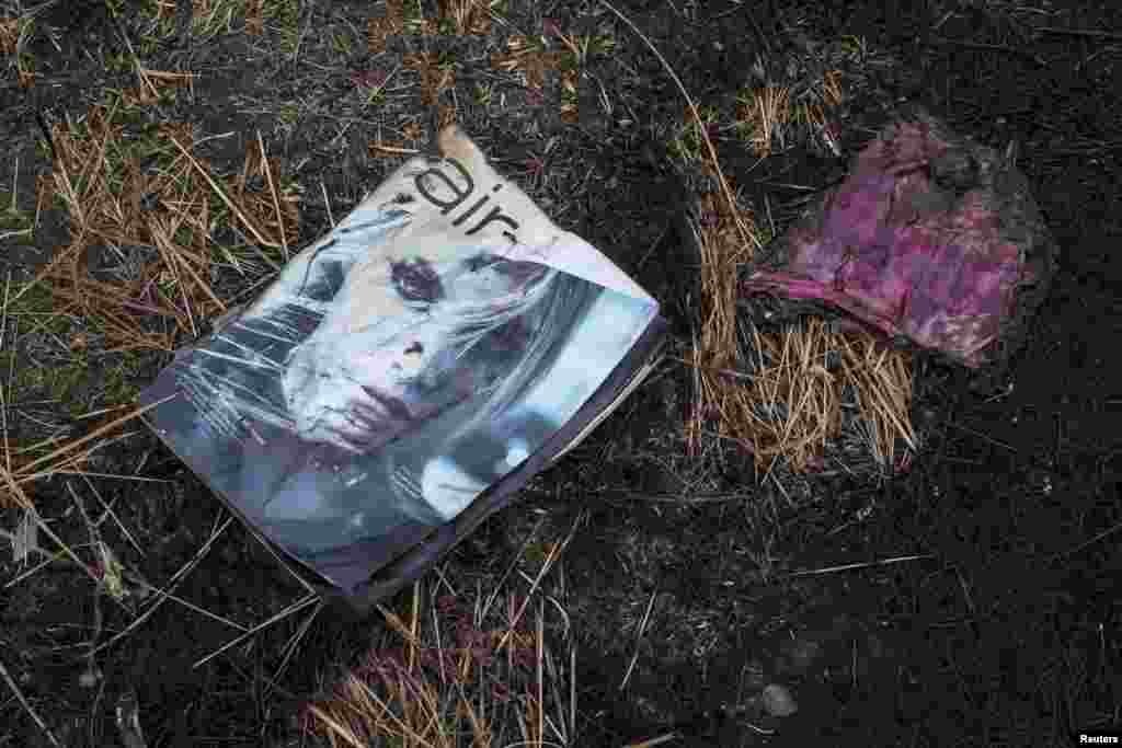 An &quot;Air&quot; in-flight magazine is pictured at the site where the downed Malaysia Airlines flight MH17 crashed, near the village of Hrabove in Ukraine&#39;s Donetsk region, on September 9. (Reuters/Marko Djurica)