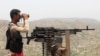 A pro-government fighter on the front line in southwestern Yemen in July 2018. 