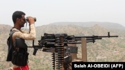 A pro-government fighter on the front line in southwestern Yemen in July 2018. 