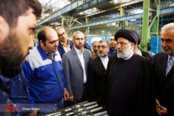 Head of Iran's Judiciary Ebrahim Raeesi, visiting Tabriz Machinery Manufacturing Company during his trip to Tabriz, East Azarbaijan province, on October 31, 2019