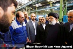 Head of Iran's Judiciary Ebrahim Raeesi, visiting Tabriz Machinery Manufacturing Company during his trip to Tabriz, East Azarbaijan province, on October 31, 2019