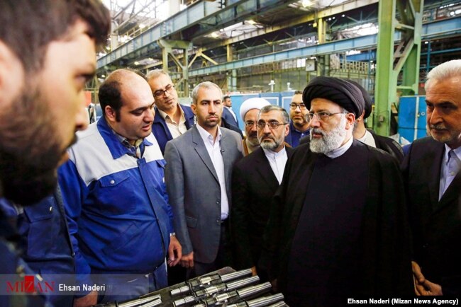Head of Iran's Judiciary Ebrahim Raeesi, visiting Tabriz Machinery Manufacturing Company during his trip to Tabriz, East Azarbaijan province, on October 31, 2019