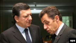 European Commission President Jose Manuel Barroso (left) with French President Nicolas Sarkozy at the summit in Brussels