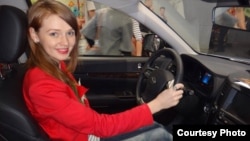 Yekaterina Kondratyeva says the economic crisis made her new car much more expensive.