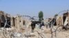 Afghan security officials patrol in restive Nad-e-Ali district, after they claimed to have recaptured the area from the Taliban militants during an operation in Helmand province, October 18, 2017