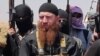 A video grab showing Islamic State military leader and Georgian native Umar al-Shishani (Tarkhan Batirashvili) with other militants.