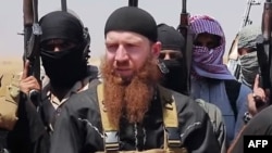 Islamic State military leader Umar al-Shishani (Tarkhan Batirashvili) (center) has been "killed" in Syria and Iraq at least four times.
