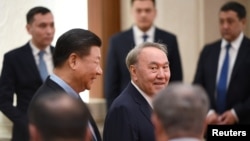 Нурсултан Назарбаев в бытность президентом Казахстана и глава Китая Си Цзиньпин. Пекин, 7 июня 2018 года.