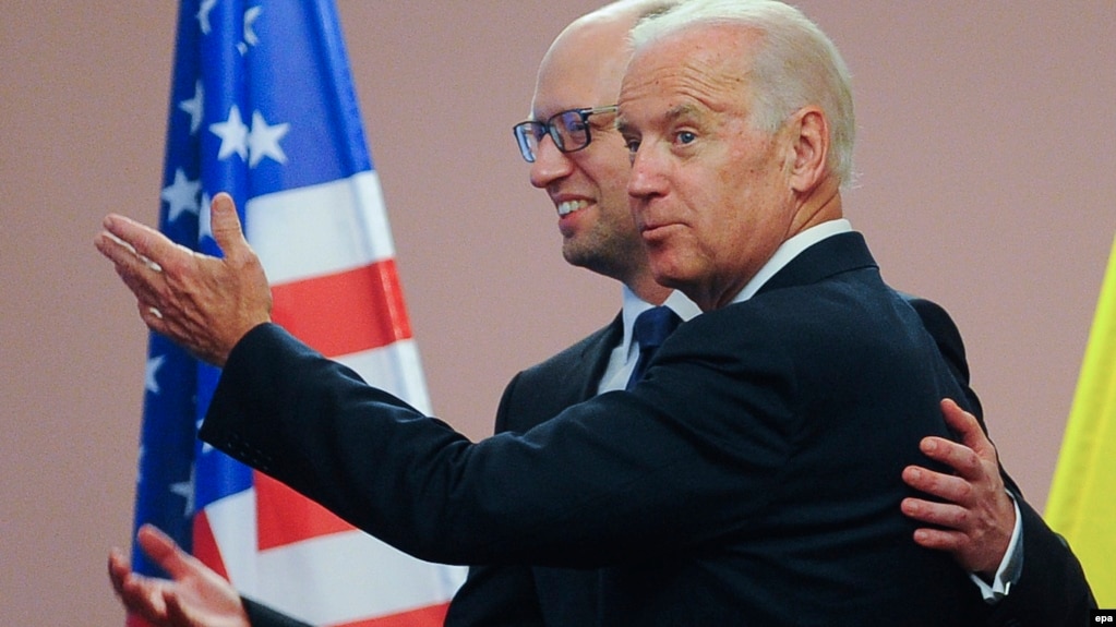 U.S. Vice President Joe Biden (right) meets with Ukrainian Prime Minister Arseniy Yatsenyuk in Kyiv on June 7.