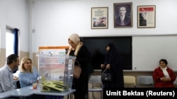 People voting in Ankara on March 31.