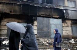 Сожженное здание банка в иранском городе Шахрияр. 20 ноября 2019 года