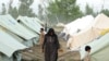 Displaced residents of Swat and Buner at a makeshift camp in Mardan on May 10