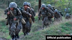 Nagorno-Karabakh -- Soldiers leave a Karabakh Armenian military base at the start of exercises, September 24, 2019.