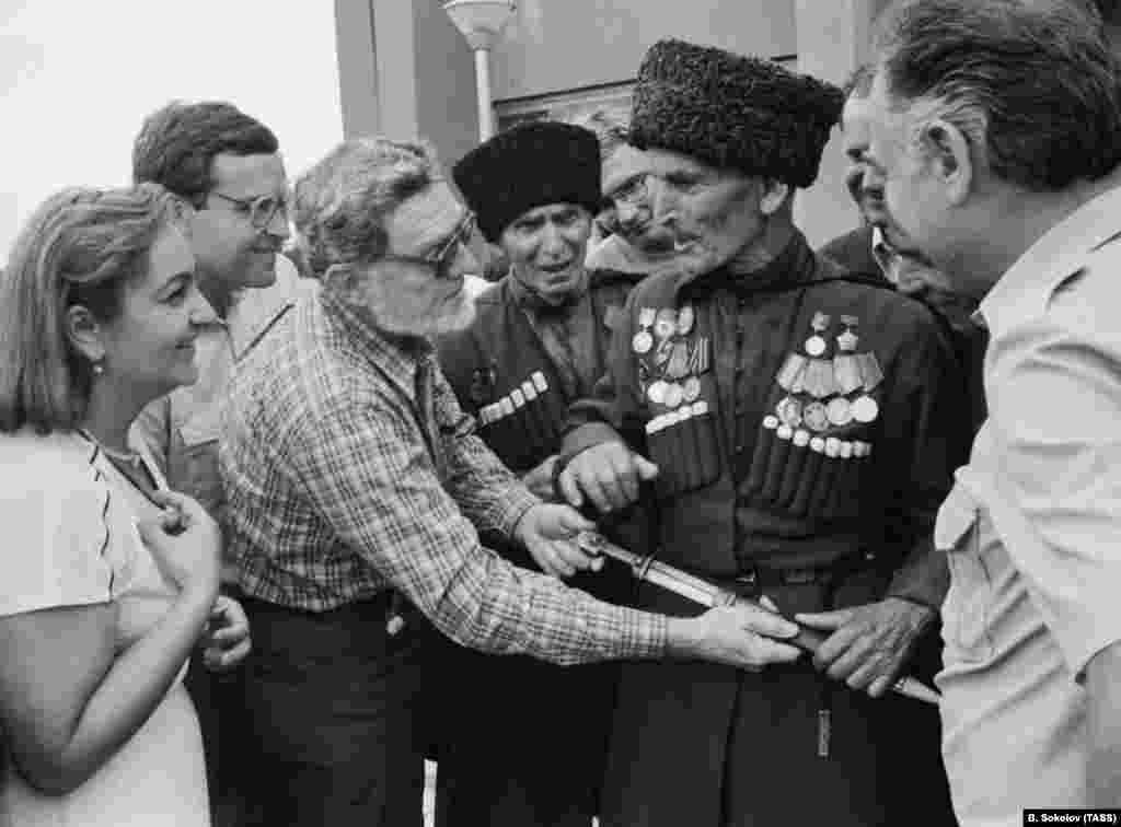 Elderly Abkhaz men with a visiting professor in the 1980s. Under Soviet rule, Abkhazia was initially a full-fledged republic, but in 1931 it was incorporated into Soviet Georgia by Josef Stalin. When this photo was taken, ethnic Abkhaz made up less than 18 percent of Abkhazia's population. 