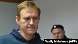Российский оппозиционный политик Алексей Навальный, основатель Фонда борьбы с коррупцией, на слушаниях по его апелляции на арест. Москва, 3 октября 2018 года. 