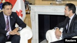 Georgian President Mikheil Saakashvili (left) meets with NATO Secretary-General Anders Fogh Rasmussen in Tbilisi