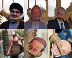 ماکت‌هایی از «اعدام» نمادین ماکت‌های حسن نصرالله و دیگر مقامات لبنان در دست معترضان لبنانی