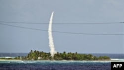 A U.S. interceptor missile is tested over the Marshall Islands in the Pacific.