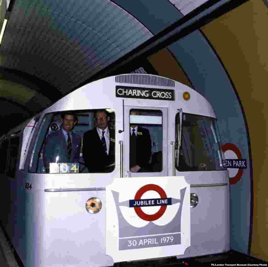 Britain&#39;s Prince Charles (left) rides in the front of a carriage at the official opening of the Jubilee Line in 1979.