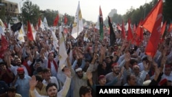 Pakistani tribesmen gather for a protest rally in Islamabad on October 9.