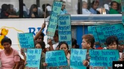 FILE: A protest against human trafficking in the Philippines