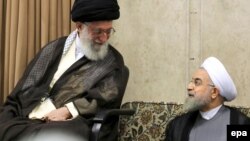 Iranian Supreme Leader Ayatollah Ali Khamenei (left) appears to have revived an intelligence unit around the same time Hassan Rohani (right) became president in the summer of 2013.