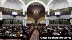 Members of the Afghan parliament attend the inauguration of the newly elected body in Kabul on April 26.