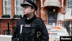 U.K. -- A police officer stands outside the Iranian consulate in central London, 14Jun2013
