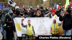 Protesters attend a demonstration to mark the first anniversary of the "yellow vests" movement in Paris, France, November 16, 2019