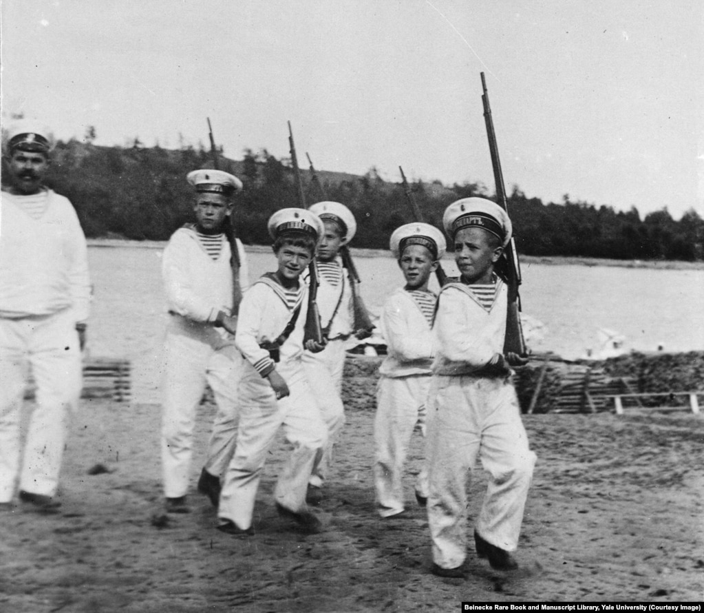 Tsarevich Aleksei, third from left, playing soldiers. Andrey Derevenko (far left) was one of two minders tasked with looking after the vulnerable heir apparent. Derevenko joined the Bolsheviks soon after the revolution and taunted the tsarevich before disappearing into obscurity.