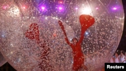 Performers take part in the opening ceremony of the 2014 Paralympic Winter Games in Sochi.