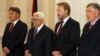 Palestinian President Mahmud Abbas (second from left) is welcomed by members of the Bosnian Presidency, Zeljko Komsic (left), Bakir Izetbegovic (second from right), and Nebojsa Radmanovic (right) upon his arrival for bilateral talks in Sarajevo earlier th