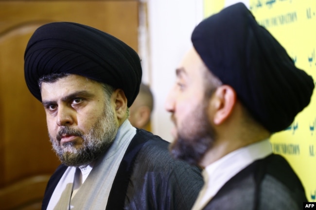 Kleriku shiit, Muqtada al-Sadr (majtas)