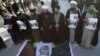 تظاهرات صدها شبه‌نظامی شیعه در بغداد در اعتراض به اعدام النمر